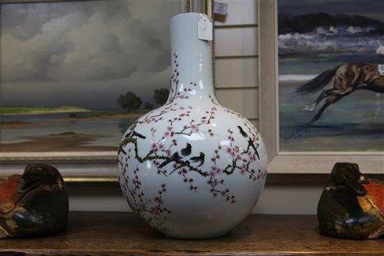 A large Chinese famille rose bottle vase, Qianlong seal mark but later, 50cm